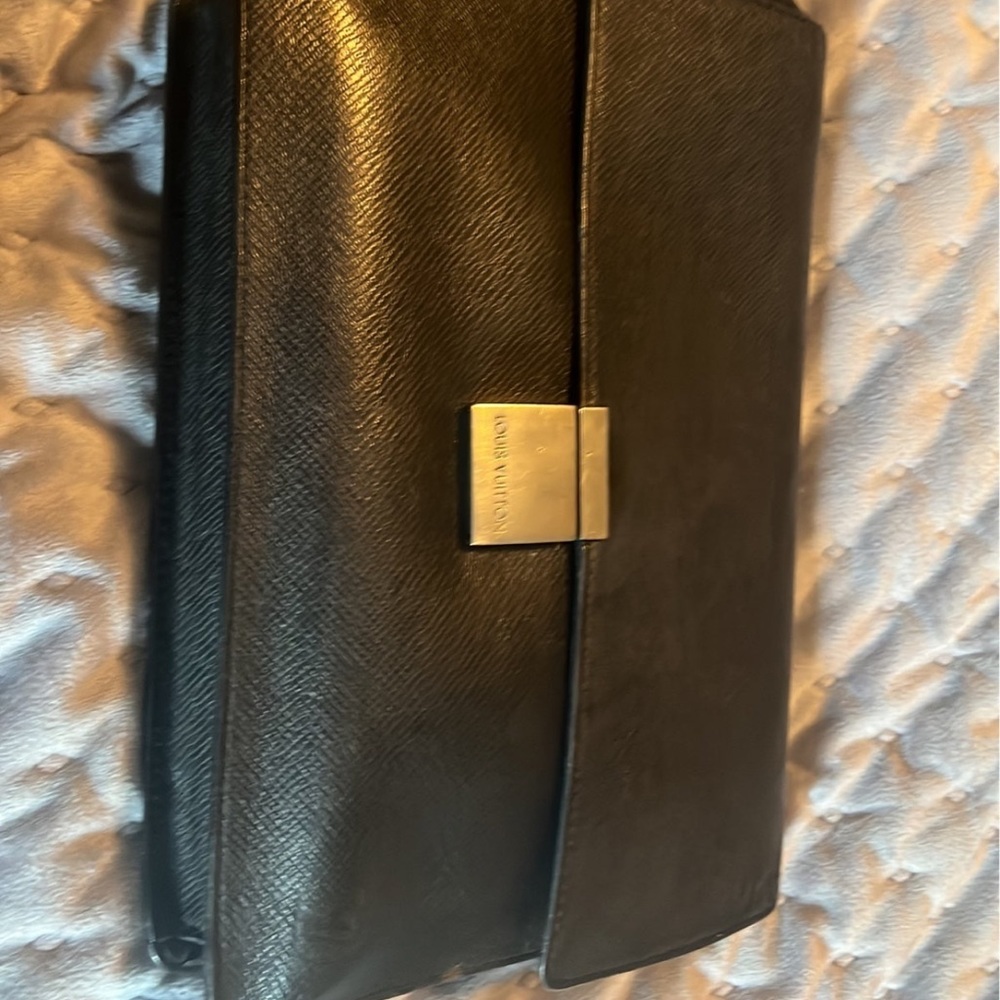 Gorgeous black leather clutch with strap!